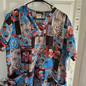 Cherokee Floral Patchwork V-Neck Scrub Top in Blue, Brown & Pink
